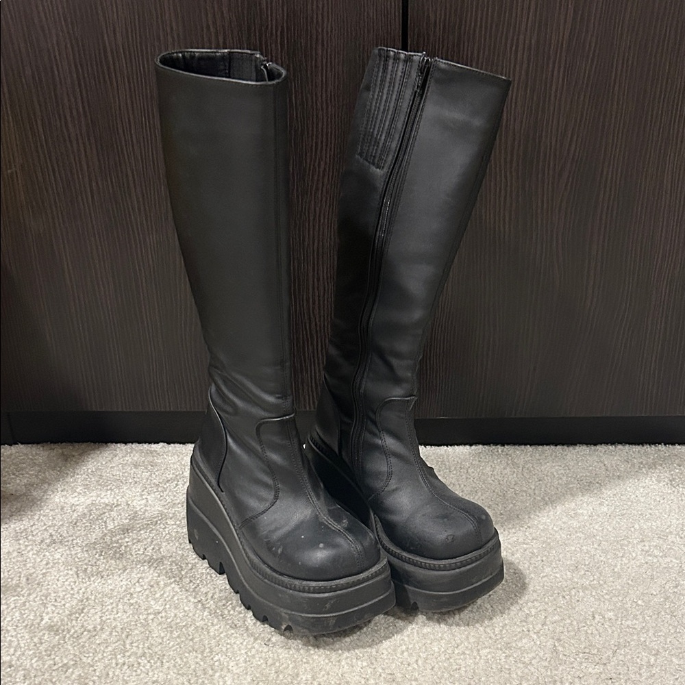 Demonia Shaker 100 Knee High Platform Boots